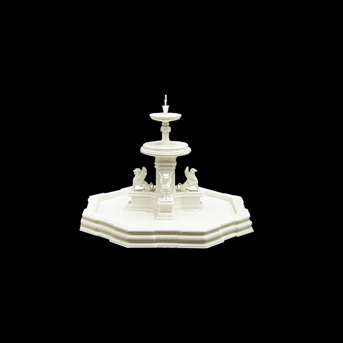 A white fountain with a central spout and two smaller spouts on either side, set against a black background.