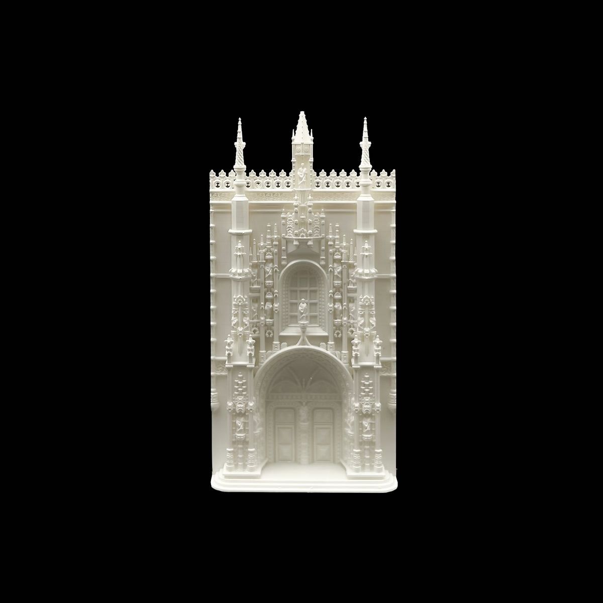 A white, ornate, and intricate 3D model of a building or monument, featuring elaborate architectural details and decorations.