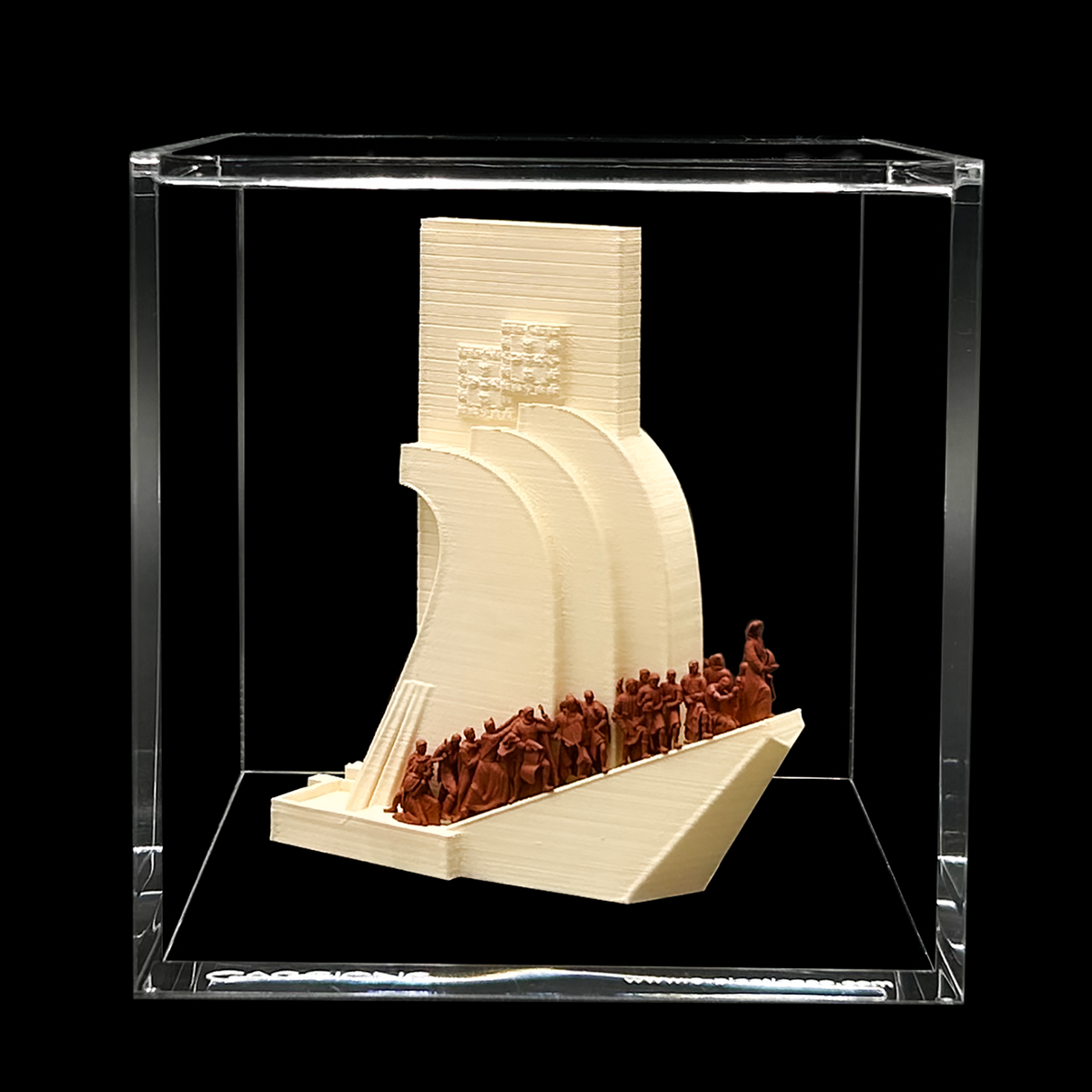 a 3D printed model of a boat with a group of people on it, displayed in a clear glass case.