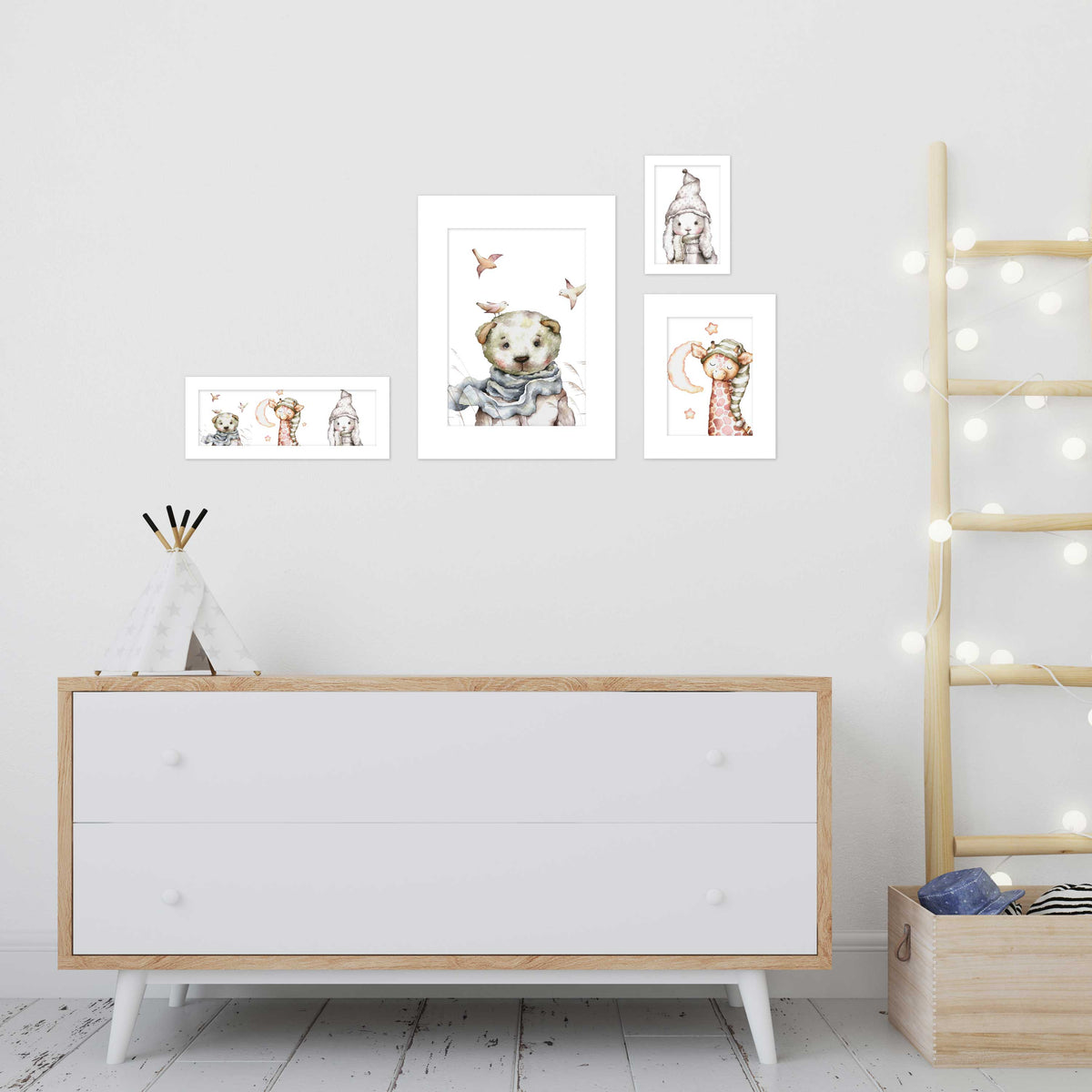 a white dresser with a framed print of a dog on it, along with other framed prints of animals on the wall. There is also a wooden ladder and a string of lights in the background.