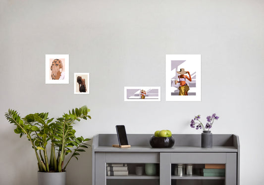 a gray cabinet with various items on top, including a potted plant, a vase with purple flowers, and a smartphone. There are also several framed pictures or prints displayed on the wall above the cabinet.