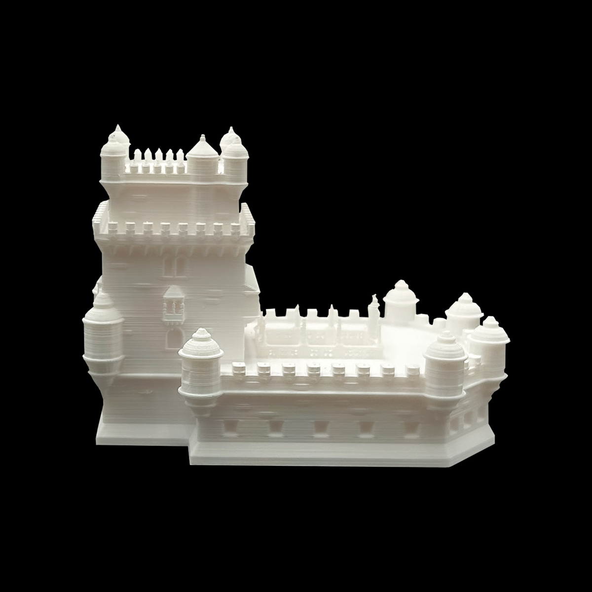 A white 3D model of a castle-like structure against a black background.