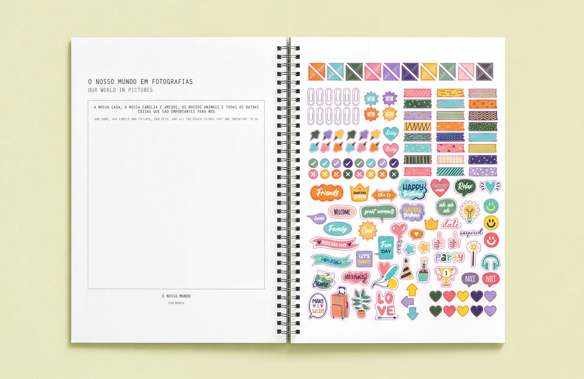 The image is a spiral-bound notebook with a blank page on the left and a colorful collage of stickers and illustrations on the right.