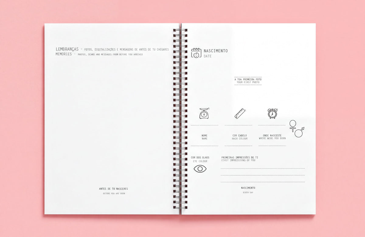 The image is a spiral notebook with a blank page on the left side and a page with various icons and text on the right side. The notebook appears to be empty, with no visible text or images.